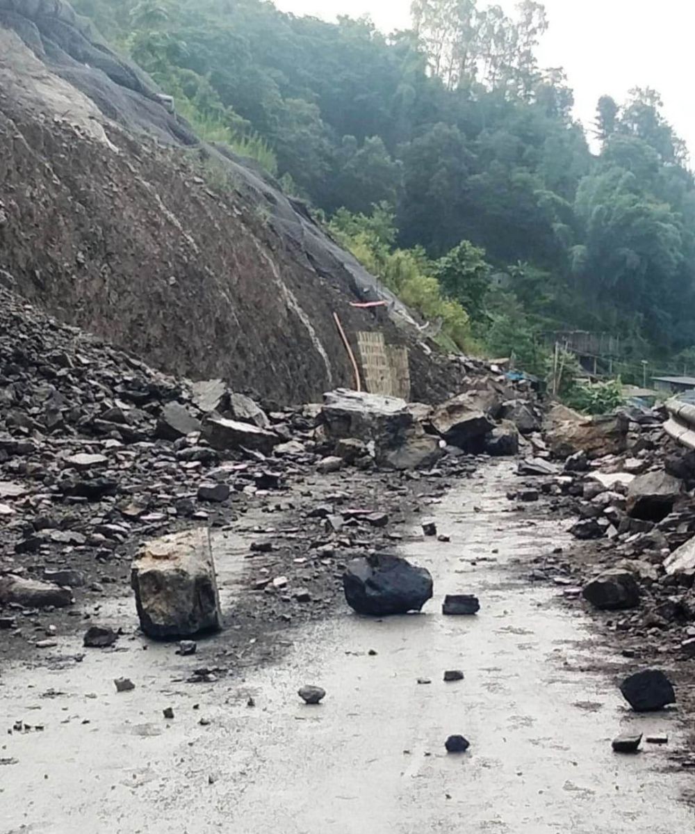 Large boulders and debris block a stretch of National Highway-2 at the Phesama Sinking Zone near Kohima following fresh rockfalls triggered by adverse weather on Saturday.